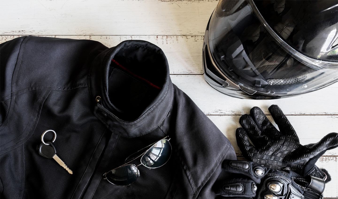 Be safe on the road and wear protective gear, such as a helmet, gloves, long trousers and a jacket.