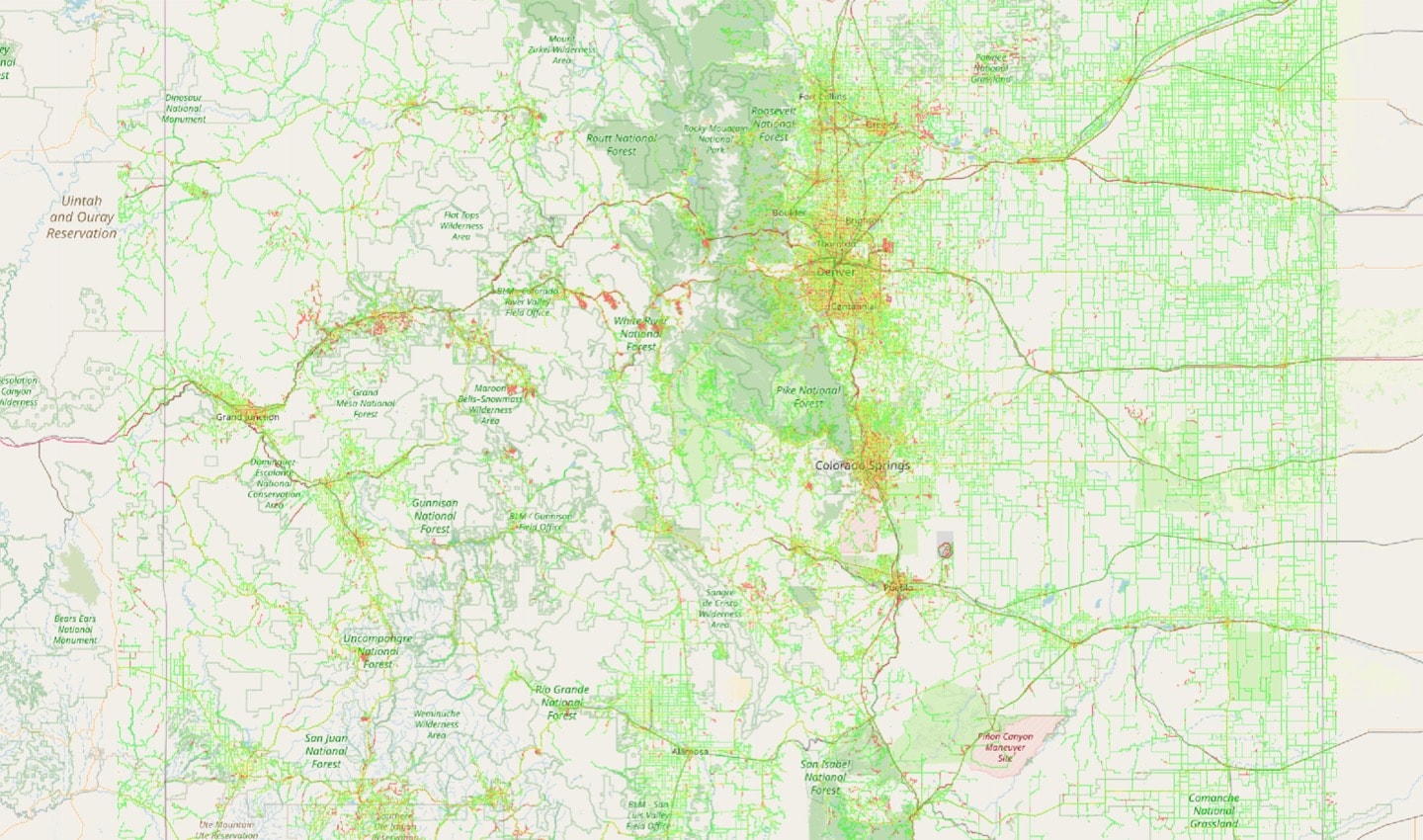 The OSM map overlaid with billions of GPS signal traces. The areas in red represent potential map errors.